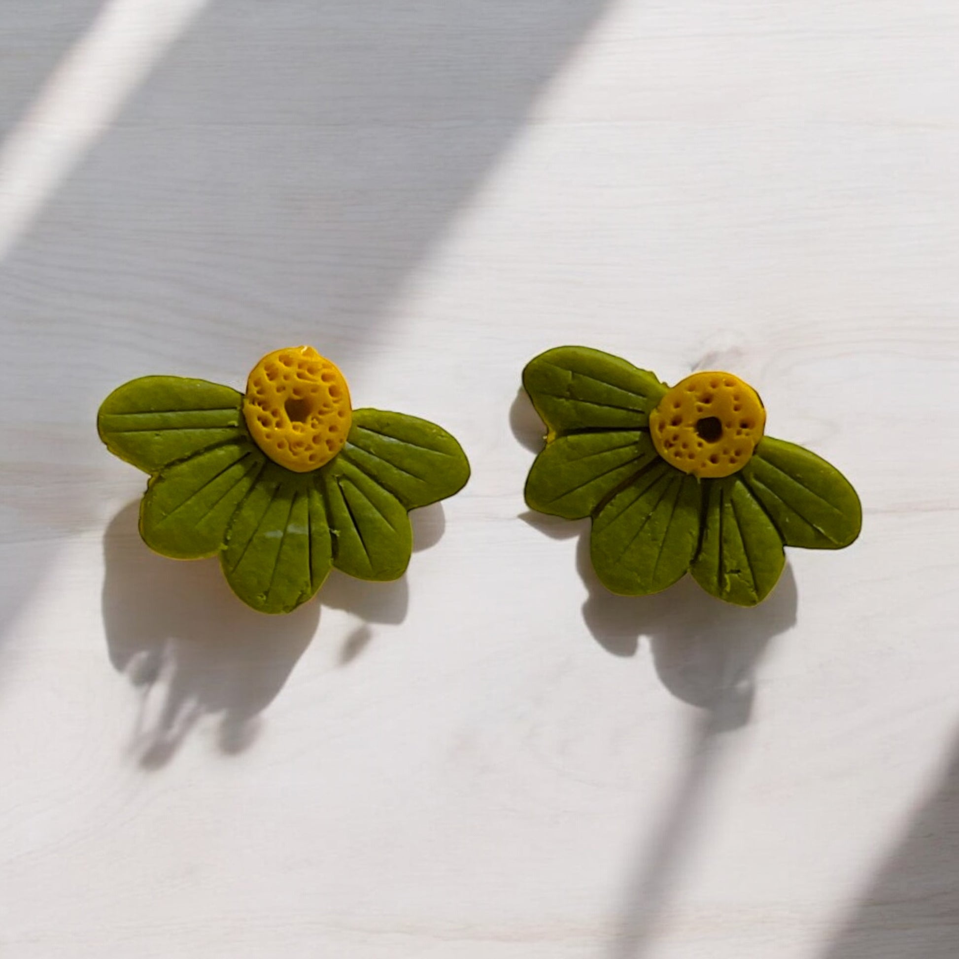 Pendientes media margarita